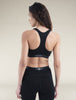 icebreaker Women's Merino 125 ZoneKnit Racerback Bra | Sport-BH black Auf und Davon Outdoor Equipment